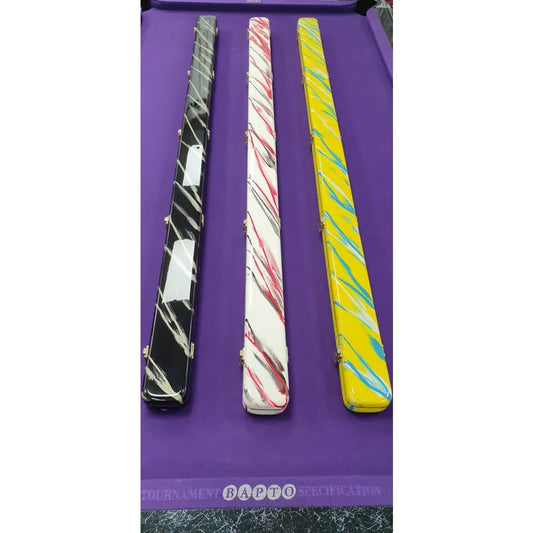 Three colorful custom fibreglass snooker cue cases on purple pool table